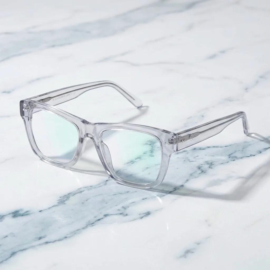 Lentes ópticos Barcelona 1 Transparente sobre mármol blanco elegante armazón premium Bonoboss #editorial_armazon #color_transparente