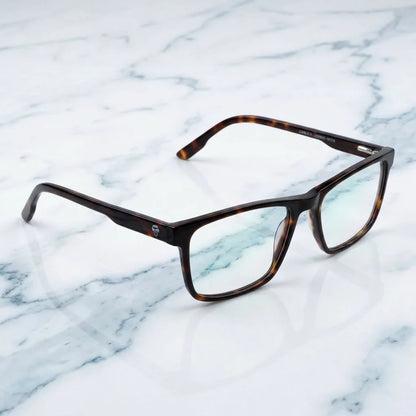 Lentes ópticos Canelo Carey sobre mármol blanco elegante armazón premium Bonoboss #editorial_armazon #color_carey