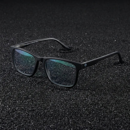 Lentes ópticos Canelo Negro sobre arena volcánica texturizada diseño sustentable Bonoboss #editorial_sustentabilidad #color_negro