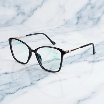 Lentes ópticos Carolina Negro sobre mármol blanco elegante armazón premium Bonoboss #editorial_armazon #color_negro