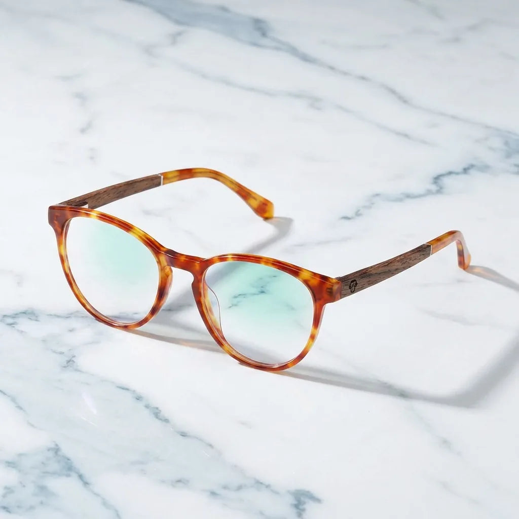 Vista frontal del modelo Chiloé 220 lentes con receta tono naranja acabado clásico #color_naranja