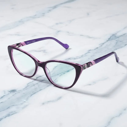 Lentes ópticos Emma Morado sobre mármol blanco elegante armazón premium Bonoboss #editorial_armazon #color_morado