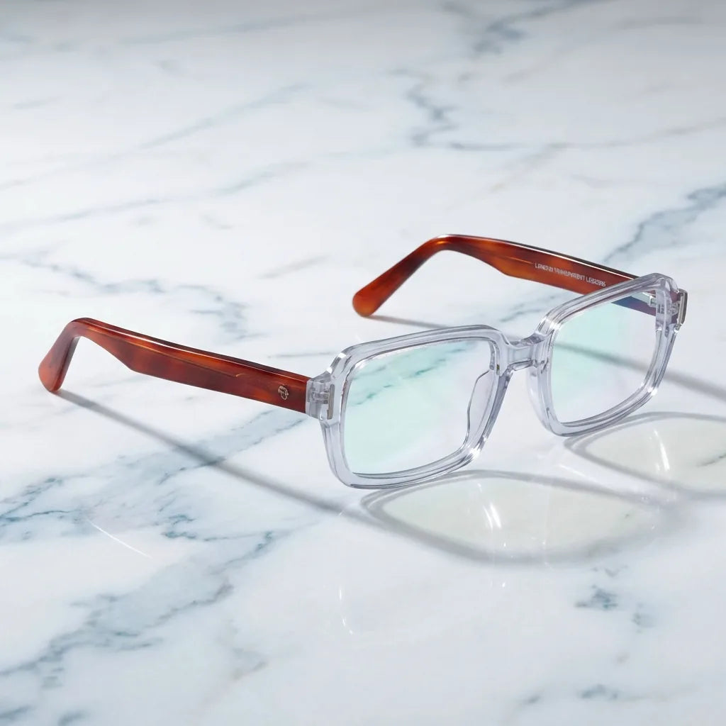 Lentes ópticos London Acetate Transparente sobre mármol blanco elegante armazón premium Bonoboss #editorial_armazon #color_transparente