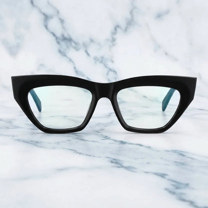 Lentes ópticos Minerva Negro sobre mármol blanco elegante calidad premium receta Bonoboss #editorial_banner_confianza #color_negro