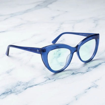 Lentes ópticos Montgat Azul sobre mármol blanco elegante armazón premium Bonoboss #editorial_armazon #color_azul
