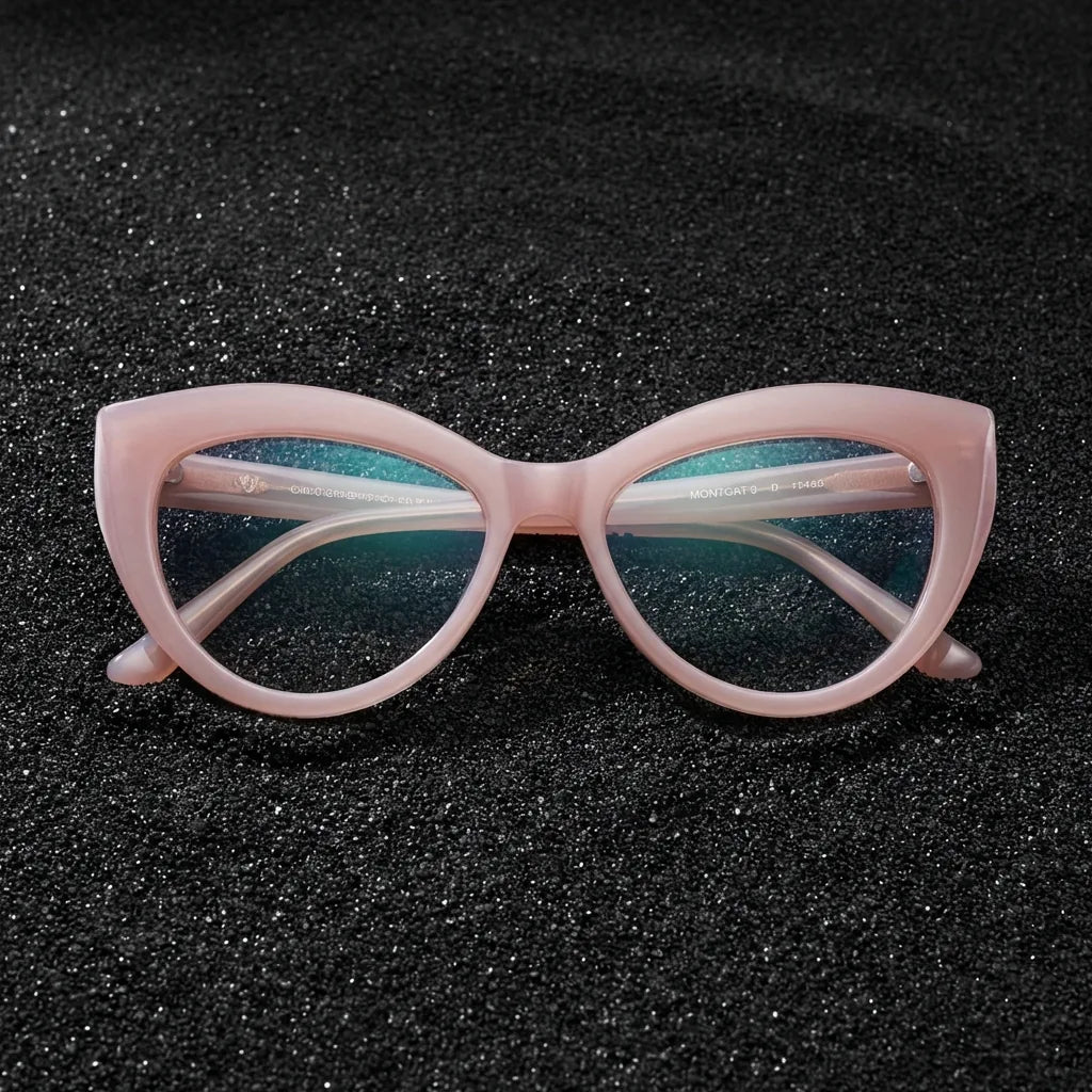 Lentes ópticos Montgat Rosado sobre arena volcánica texturizada diseño sustentable Bonoboss #editorial_sustentabilidad #color_rosado