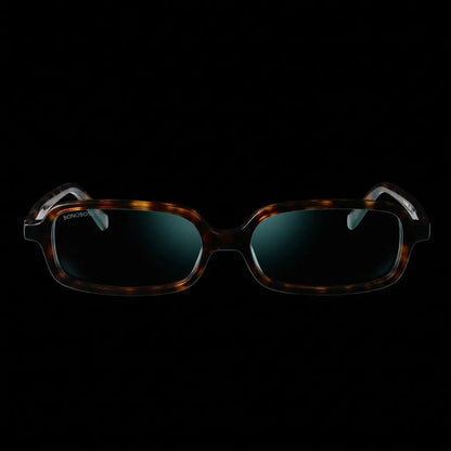 Lentes opticos Navarino Carey vista frontal dramatica iluminacion antirreflex receta optica bio-acetato Bonoboss #editorial_frontal-dramatico #color_carey
